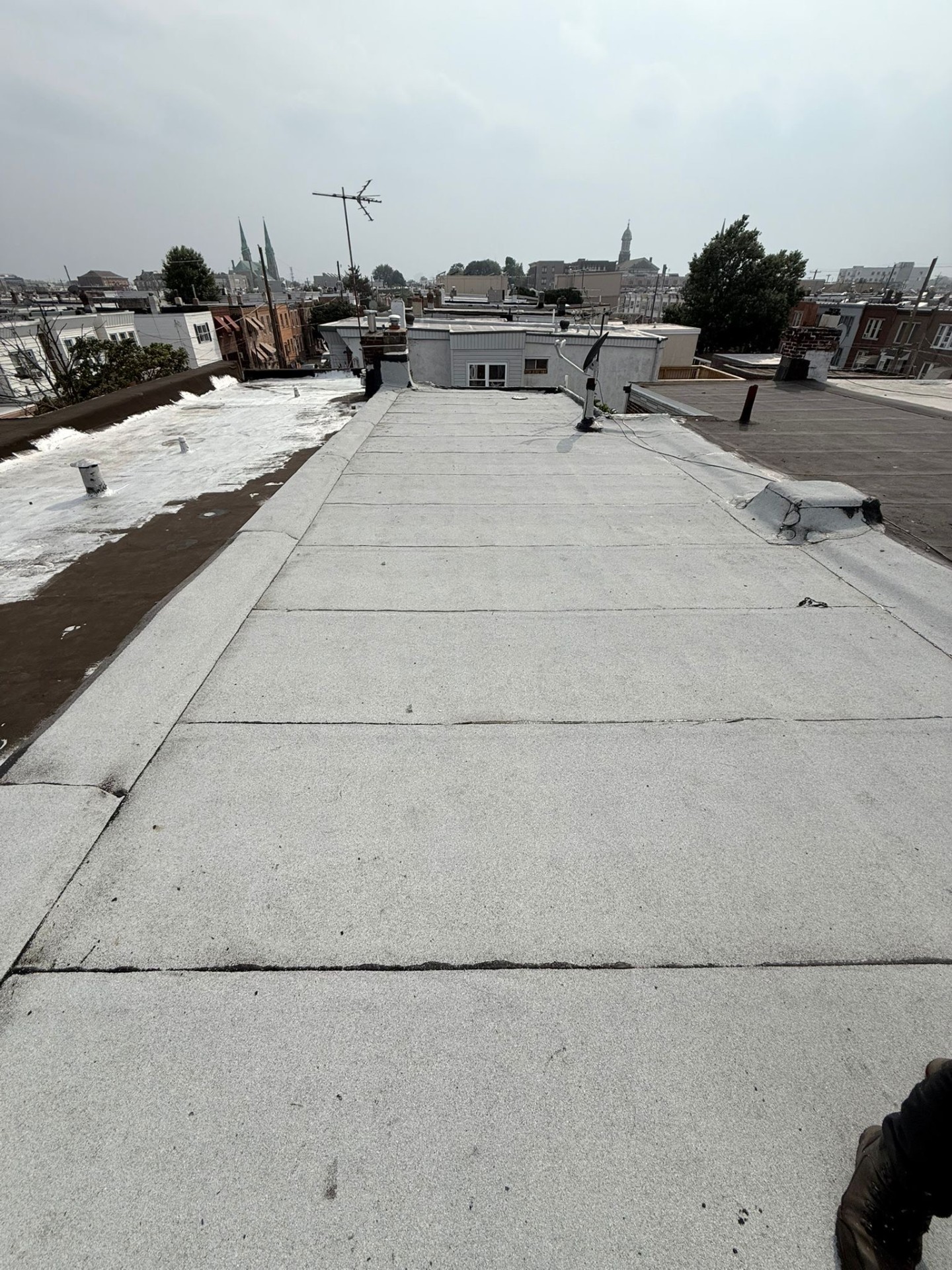Modified bitumen flat roof installation