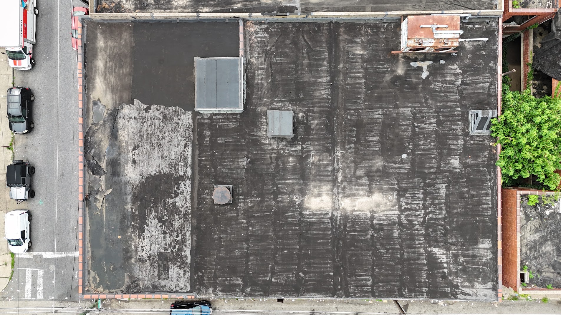 Aged flat roof prepared for restoration