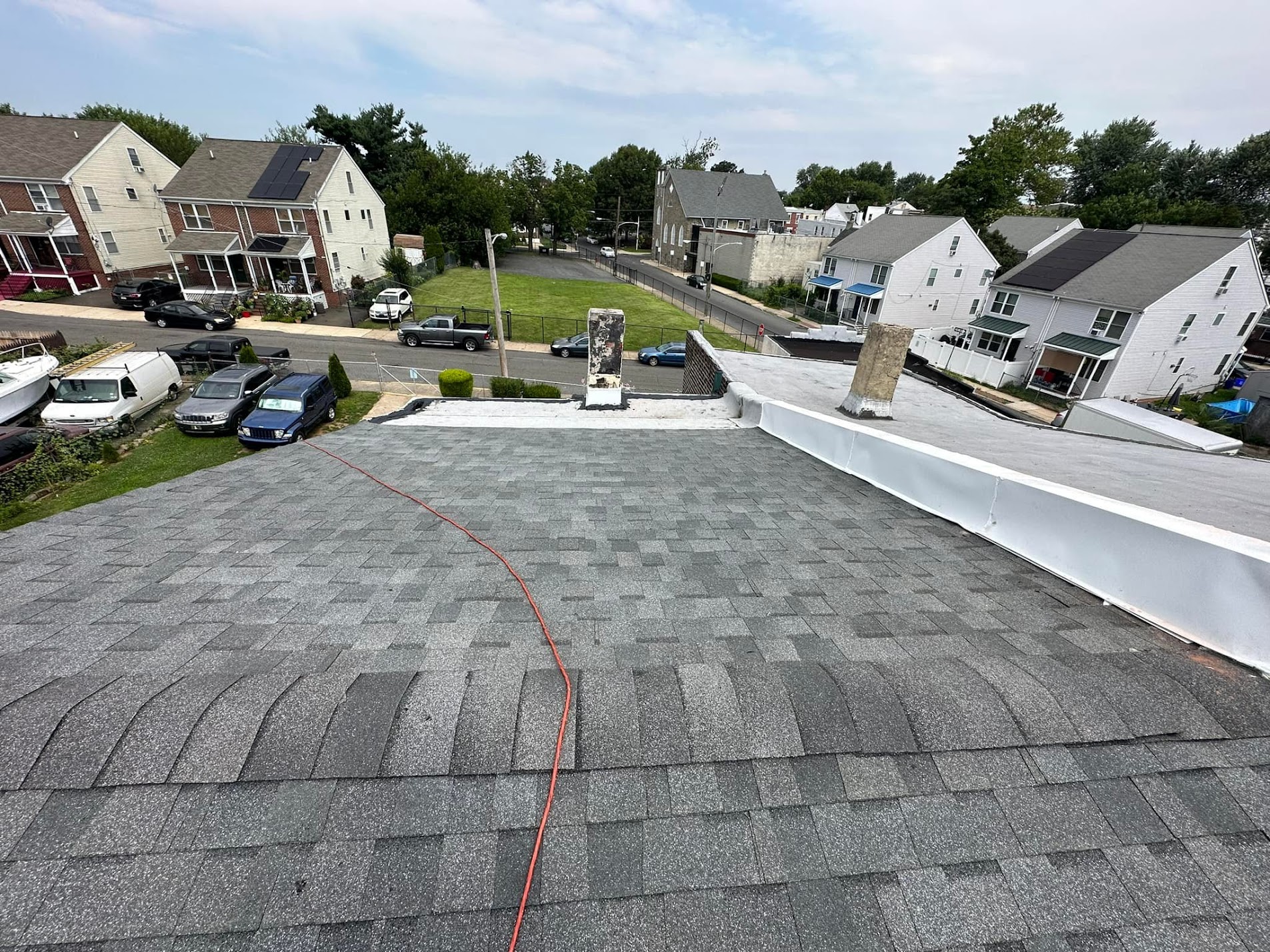 Aerial view of completed roofing project