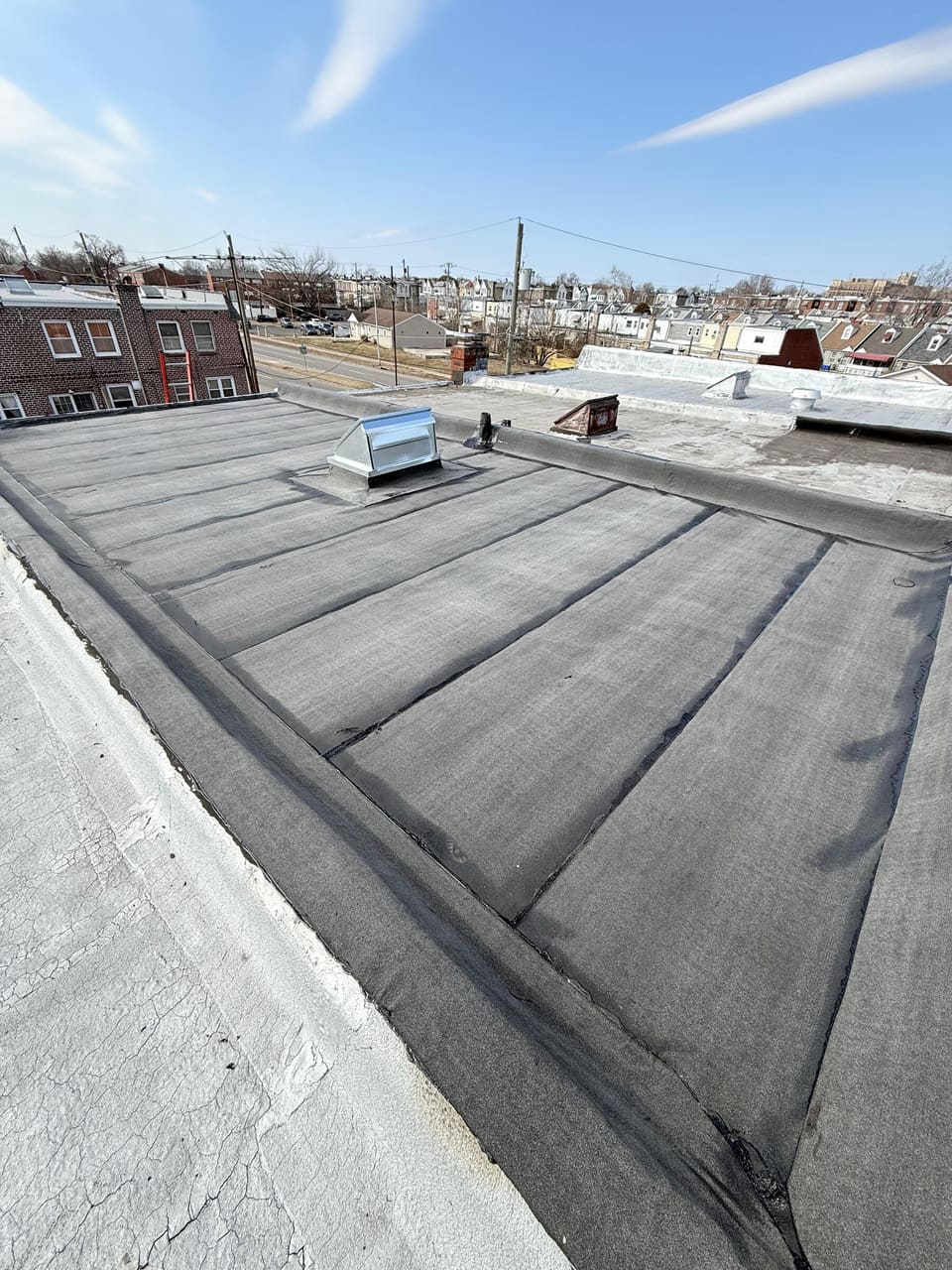New membrane with sealed seams running back along the block